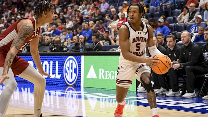 Mar 14, 2024; Nashville, TN, USA; South Carolina Gamecocks guard Meechie Johnson (5) looks to pass the ball against the Arkansas Razorbacks during the second half at Bridgestone Arena. Mandatory Credit: Steve Roberts-Imagn Images