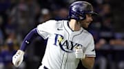 Sep 16, 2025; St. Petersburg, Florida, USA; Tampa Bay Rays second baseman Brandon Lowe (8) hits a RBI single ninth inning against the Toronto Blue Jays at George M. Steinbrenner Field. 