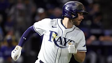 Sep 16, 2025; St. Petersburg, Florida, USA; Tampa Bay Rays second baseman Brandon Lowe (8) hits a RBI single ninth inning against the Toronto Blue Jays at George M. Steinbrenner Field. 