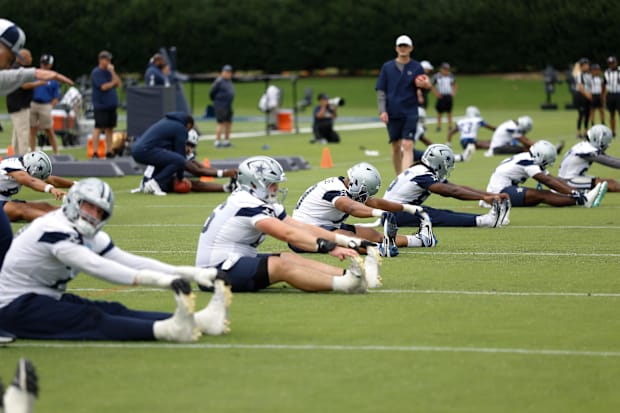 The Dallas Cowboys go through drills at the Ford Center at the Star Training Facility in Frisco, Texas. 