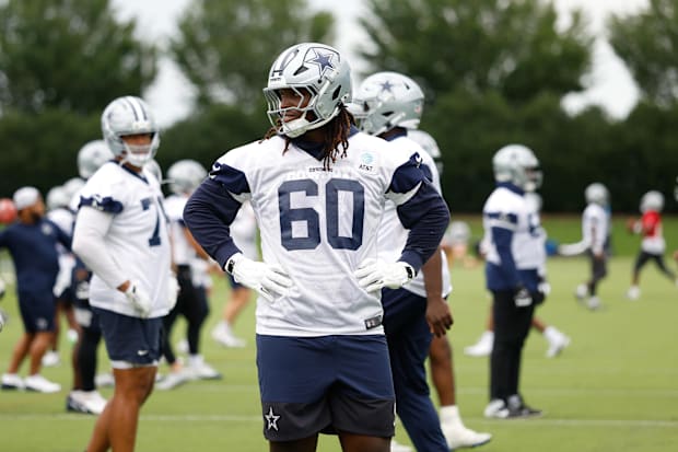 Dallas Cowboys offensive tackle Tyler Guyton goes through a drill during practice at the Ford Center.