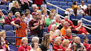 Mar 8, 2024; Greensboro, NC, USA; Virginia Tech Hokies fans applaud their team in the second half against the Miami Hurricanes at Greensboro Coliseum. Mandatory Credit: David Yeazell-Imagn Images