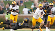 Sep 20, 2025; Waco, Texas, USA; Arizona State Sun Devils quarterback Sam Leavitt (10) breaks free of a tackle by Baylor Bears safety Devyn Bobby (3) during the first half at McLane Stadium. Mandatory Credit: Chris Jones-Imagn Images