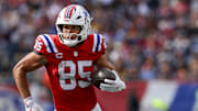 Sep 21, 2025; Foxborough, Massachusetts, USA; New England Patriots tight end Hunter Henry (85) runs the ball during the third quarter at Gillette Stadium. Mandatory Credit: Paul Rutherford-Imagn Images