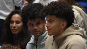 Nov 10, 2023; Durham, North Carolina, USA; Duke basketball recruits Cameron (left) and Cayden Boozer look on  during the first half between Duke and the Arizona Wildcats at Cameron Indoor Stadium. 