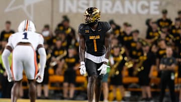 Aug 29, 2025; Waco, Texas, USA;  Baylor Bears tight end Michael Trigg (1) in action against Auburn Tigers safety Champ Anthony (1) during the first half at McLane Stadium. Mandatory Credit: Chris Jones-Imagn Images