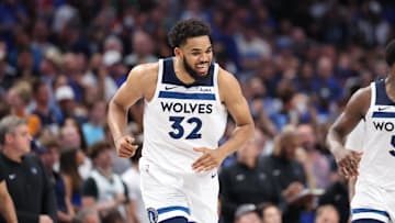May 28, 2024; Dallas, Texas, USA; Minnesota Timberwolves center Karl-Anthony Towns (32) reacts against the Dallas Mavericks during the fourth quarter of game four of the western conference finals for the 2024 NBA playoffs at American Airlines Center. Mandatory Credit: Kevin Jairaj-Imagn Images