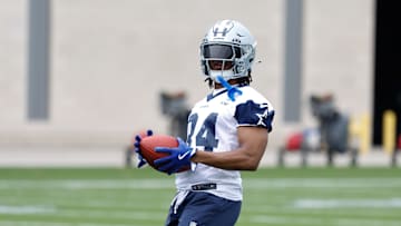 Jun 10, 2025; Arlington, TX, USA; Dallas Cowboys running back Jaydon Blue (34) goes through a drill during practice at the Ford Center at the Star Training Facility in Frisco, Texas. Mandatory Credit: Chris Jones-Imagn Images