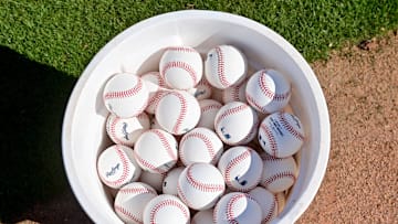Feb 15, 2024; Peoria, AZ, USA; General view of a bucket of baseballs during a Spring Training workout at Peoria Sports Complex.  Mandatory Credit: Matt Kartozian-Imagn Images