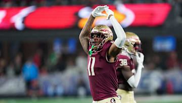 Dec 2, 2023; Charlotte, NC, USA; Florida State Seminoles defensive lineman Patrick Payton (11) reacts during the fourth quarter against the Louisville Cardinals at Bank of America Stadium. Mandatory Credit: Jim Dedmon-Imagn Images
