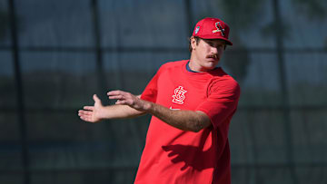 Feb 15, 2024; Jupiter, FL, USA;  St. Louis Cardinals starting pitcher Miles Mikolas (39) warms-up