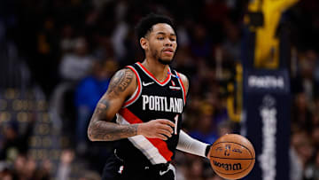 Feb 10, 2025; Denver, Colorado, USA; Portland Trail Blazers guard Anfernee Simons (1) dribbles the ball up court in the second quarter against the Denver Nuggets at Ball Arena. Mandatory Credit: Isaiah J. Downing-Imagn Images