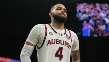 Apr 5, 2025; San Antonio, TX, USA;  Auburn Tigers forward Johni Broome (4) reacts after losing to the Florida Gators in the semifinals of the men's Final Four of the 2025 NCAA Tournament at the Alamodome. Mandatory Credit: Robert Deutsch-Imagn Images