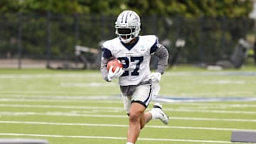 Jun 10, 2025; Arlington, TX, USA;  Dallas Cowboys running back Miles Sanders (27) goes through a drill during practice at the Ford Center at the Star Training Facility in Frisco, Texas. Mandatory Credit: Chris Jones-Imagn Images