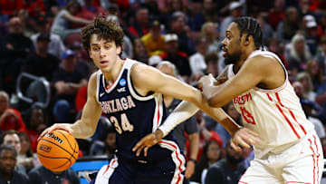 Mar 22, 2025; Wichita, KS, USA; Gonzaga Bulldogs forward Braden Huff (34) drives to the basket againstHouston Cougars forward J'Wan Roberts (13) during the first half at Intrust Bank Arena. Mandatory Credit: Nick Tre. Smith-Imagn Images