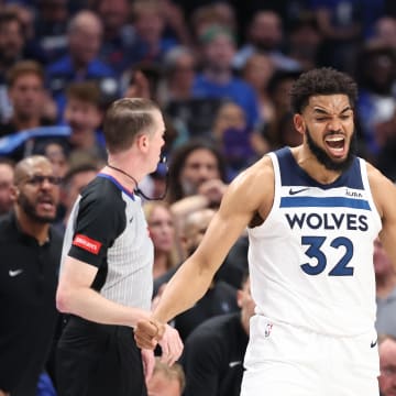 Minnesota Timberwolves center Karl-Anthony Towns (32) reacts during the fourth quarter against the Dallas Mavericks in Game 4 of the Western Conference finals at American Airlines Center in Dallas on May 28, 2024.