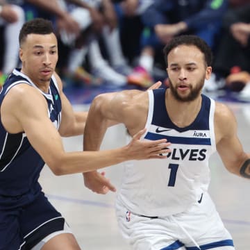 May 28, 2024; Dallas, Texas, USA; Minnesota Timberwolves forward Kyle Anderson (1) dribbles against Dallas Mavericks guard Dante Exum (0) during the second quarter of game four of the western conference finals for the 2024 NBA playoffs at American Airlines Center. Mandatory Credit: Kevin Jairaj-USA TODAY Sports