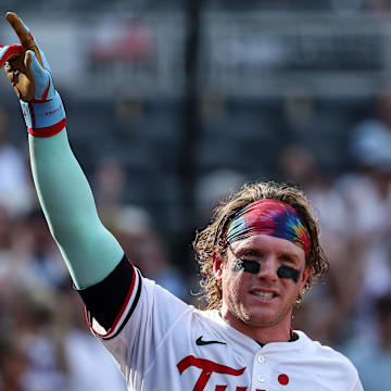 Jul 4, 2025; Minneapolis, Minnesota, USA; Minnesota Twins left fielder Harrison Bader (12) celebrates his solo walk-off home run against the Tampa Bay Rays during the ninth inning at Target Field. Mandatory Credit: Matt Krohn-Imagn Images