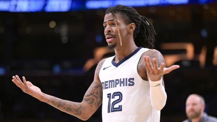 Jan 5, 2024; Los Angeles, California, USA; Memphis Grizzlies guard Ja Morant (12) reacts in the second half against the Los Angeles Lakers at Crypto.com Arena. Mandatory Credit: Jayne Kamin-Oncea-USA TODAY Sports