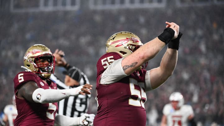 Dec 2, 2023; Charlotte, NC, USA; Florida State Seminoles defensive lineman Braden Fiske (55) gestures to his ring finger after sacking Louisville Cardinals quarterback Jack Plummer (not pictured) in the fourth quarter at Bank of America Stadium. Mandatory Credit: Bob Donnan-USA TODAY Sports
