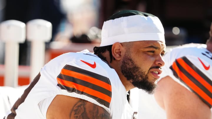 Nov 26, 2023; Denver, Colorado, USA;  Cleveland Browns center Nick Harris (53) sits on the sidelines before the game against the Denver Broncos at Empower Field at Mile High. Mandatory Credit: Ron Chenoy-USA TODAY Sports