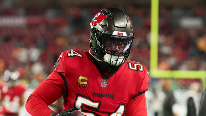 Jan 15, 2024; Tampa, Florida, USA; Tampa Bay Buccaneers linebacker Lavonte David (54) carries the ball during warm ups before a 2024 NFC wild card game against the Philadelphia Eagles at Raymond James Stadium. Mandatory Credit: Kim Klement Neitzel-USA TODAY Sports