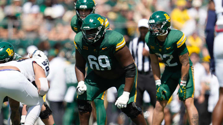 Sep 13, 2025; Waco, Texas, USA; Baylor Bears offensive lineman Sidney Fugar (69) in action against the Samford Bulldogs during the first half at McLane Stadium. Mandatory Credit: Chris Jones-Imagn Images