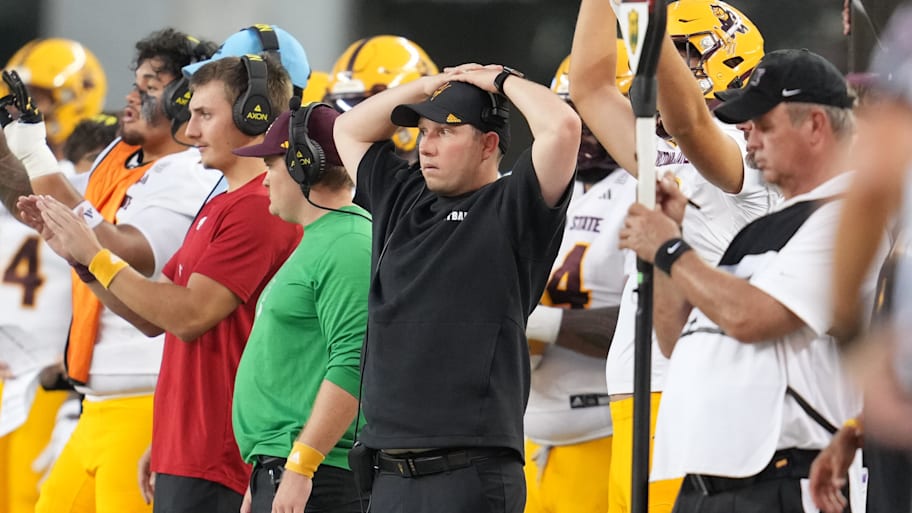 Kenny Dillingham holds his head during an Arizona State Sun Devils game against the Baylor Bears.