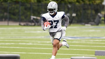Dallas Cowboys RB Miles Sanders goes through a drill during practice at the Ford Center at the Star Training Facility.
