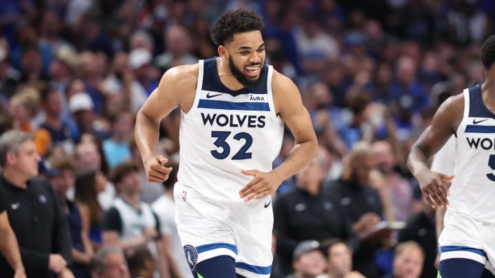 May 28, 2024; Dallas, Texas, USA; Minnesota Timberwolves center Karl-Anthony Towns (32) reacts against the Dallas Mavericks during the fourth quarter of game four of the western conference finals for the 2024 NBA playoffs at American Airlines Center. Mandatory Credit: Kevin Jairaj-USA TODAY Sports