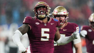 Dec 2, 2023; Charlotte, NC, USA; Florida State Seminoles defensive lineman Jared Verse (5) reacts