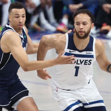 May 28, 2024; Dallas, Texas, USA; Minnesota Timberwolves forward Kyle Anderson (1) dribbles against Dallas Mavericks guard Dante Exum (0) during the second quarter of game four of the western conference finals for the 2024 NBA playoffs at American Airlines Center.