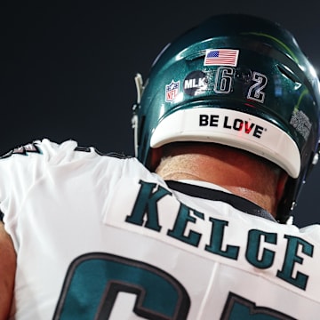 Jan 15, 2024; Tampa, Florida, USA; Philadelphia Eagles center Jason Kelce (62) wears an MLK sticker on his helmet in observance of Martin Luther King Jr. Day before a a 2024 NFC wild card game against the Tampa Bay Buccaneers at Raymond James Stadium. Mandatory Credit: Nathan Ray Seebeck-Imagn Images