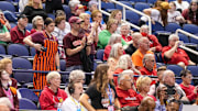 Mar 8, 2024; Greensboro, NC, USA; Virginia Tech Hokies fans applaud their team in the second half against the Miami Hurricanes at Greensboro Coliseum. Mandatory Credit: David Yeazell-Imagn Images