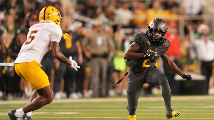 Sep 20, 2025; Waco, Texas, USA; Baylor Bears wide receiver Kole Wilson (2) returns a kick against Arizona State Sun Devils safety Kyndrich Breedlove (5) during the second half at McLane Stadium. Mandatory Credit: Chris Jones-Imagn Images