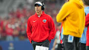 Jan 1, 2024; Glendale, AZ, USA; Liberty Flames head coach Jamey Chadwell looks on from the sidelines during the second half against the Oregon Ducks in the 2024 Fiesta Bowl at State Farm Stadium. Mandatory Credit: Joe Camporeale-Imagn Images