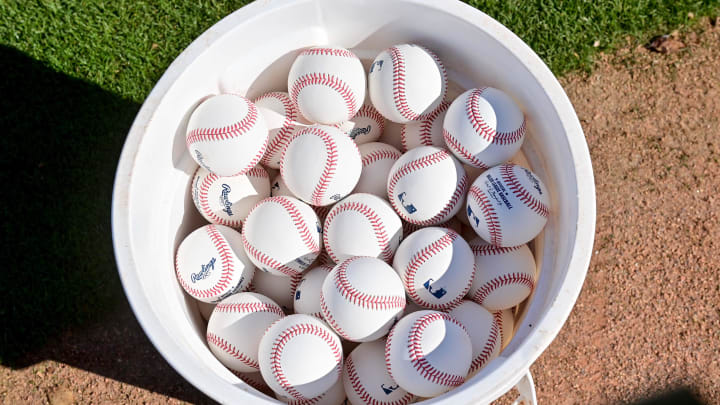 Feb 15, 2024; Peoria, AZ, USA; General view of a bucket of baseballs during a Spring Training workout at Peoria Sports Complex.  Mandatory Credit: Matt Kartozian-USA TODAY Sports