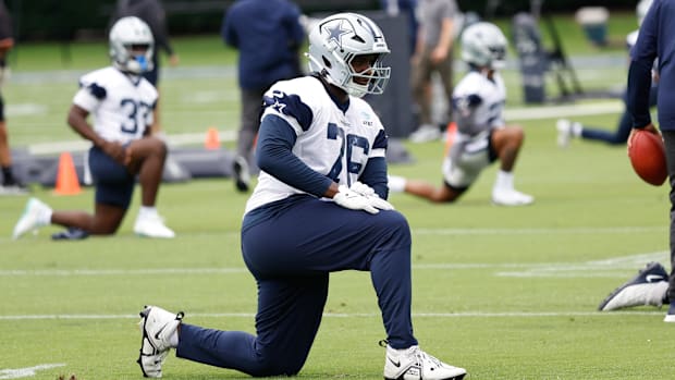 Dallas Cowboys OT Asim Richards goes through a drill during practice at the Ford Center at the Star Training Facility.
