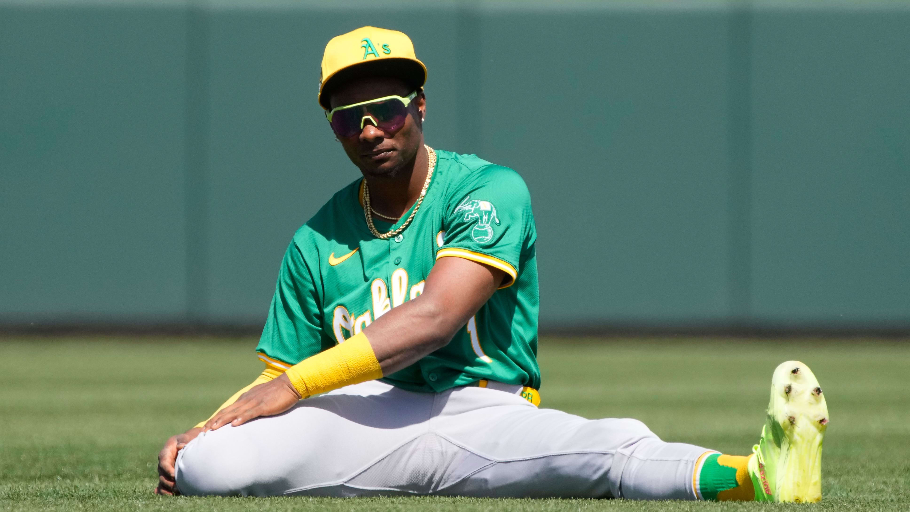 Mar 14, 2024; Mesa, Arizona, USA; Oakland Athletics center fielder Esteury Ruiz (1) stretches before a Spring Training game.