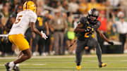 Sep 20, 2025; Waco, Texas, USA; Baylor Bears wide receiver Kole Wilson (2) returns a kick against Arizona State Sun Devils safety Kyndrich Breedlove (5) during the second half at McLane Stadium. Mandatory Credit: Chris Jones-Imagn Images