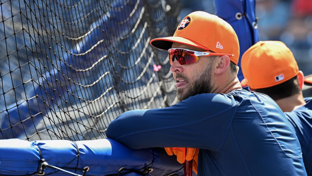 Mar 8, 2024; Clearwater, Florida, USA; Houston Astros third baseman David Hensley (11) watches batting practice before the spring training game against the Philadelphia Phillies at BayCare Ballpark. 