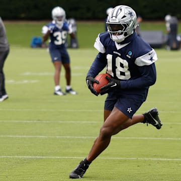 Dallas Cowboys linebacker Damone Clark goes through a drill during practice.