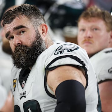 Jan 15, 2024; Tampa, Florida, USA;  Philadelphia Eagles center Jason Kelce (62) looks on from the sideline during the first half of a 2024 NFC wild card game against the Tampa Bay Buccaneers at Raymond James Stadium. Mandatory Credit: Nathan Ray Seebeck-Imagn Images