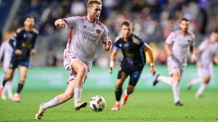 May 11, 2024; Philadelphia, Pennsylvania, USA; Orlando City forward Duncan McGuire (13) dribbles against the Philadelphia Union during the second half at Subaru Park. Mandatory Credit: Caean Couto-USA TODAY Sports