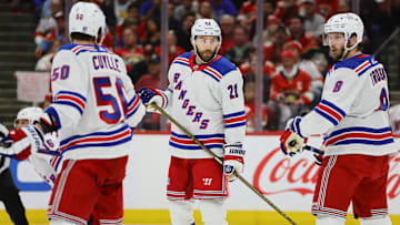 May 26, 2024; Sunrise, Florida, USA; New York Rangers center Barclay Goodrow (21) talks to defenseman Jacob Trouba (8) and left wing Will Cuylle (50) during the first period in game three of the Eastern Conference Final of the 2024 Stanley Cup Playoffs at Amerant Bank Arena. Mandatory Credit: Sam Navarro-Imagn Images