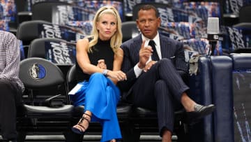 May 28, 2024; Dallas, Texas, USA; Jaclyn Cordeiro and Alex Rodriguez watch warm ups before game four of the western conference finals between the Dallas Mavericks and the Minnesota Timberwolves for the 2024 NBA playoffs at American Airlines Center. 