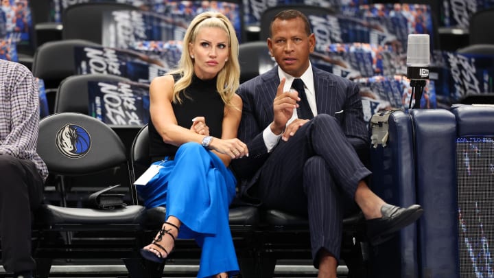 May 28, 2024; Dallas, Texas, USA; Jaclyn Cordeiro and Alex Rodriguez watch warm ups before game four of the western conference finals between the Dallas Mavericks and the Minnesota Timberwolves for the 2024 NBA playoffs at American Airlines Center. 