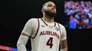 Apr 5, 2025; San Antonio, TX, USA;  Auburn Tigers forward Johni Broome (4) reacts after losing to the Florida Gators in the semifinals of the men's Final Four of the 2025 NCAA Tournament at the Alamodome. Mandatory Credit: Robert Deutsch-Imagn Images