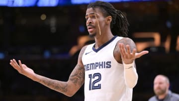 Jan 5, 2024; Los Angeles, California, USA; Memphis Grizzlies guard Ja Morant (12) reacts in the second half against the Los Angeles Lakers at Crypto.com Arena. Mandatory Credit: Jayne Kamin-Oncea-USA TODAY Sports