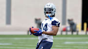 Jun 10, 2025; Arlington, TX, USA; Dallas Cowboys running back Jaydon Blue (34) goes through a drill during practice at the Ford Center at the Star Training Facility in Frisco, Texas. Mandatory Credit: Chris Jones-Imagn Images